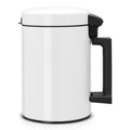 White mug with a black handle on a white background