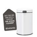White trash bin with a gray label promoting the Ocean Cleanup initiative by Brabantia on a white background.