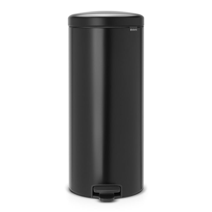 Black trash can with a step lid on a white background