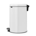 White trash can with black pedal on a white background