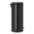 Black trash can on a white background