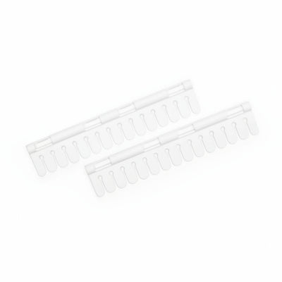 Two white rulers on a white background